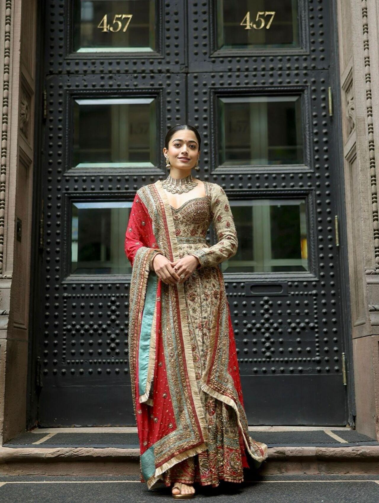 Rashmika embraces heritage in a richly embroidered ensemble paired with a vibrant dupatta and intricate jewellery